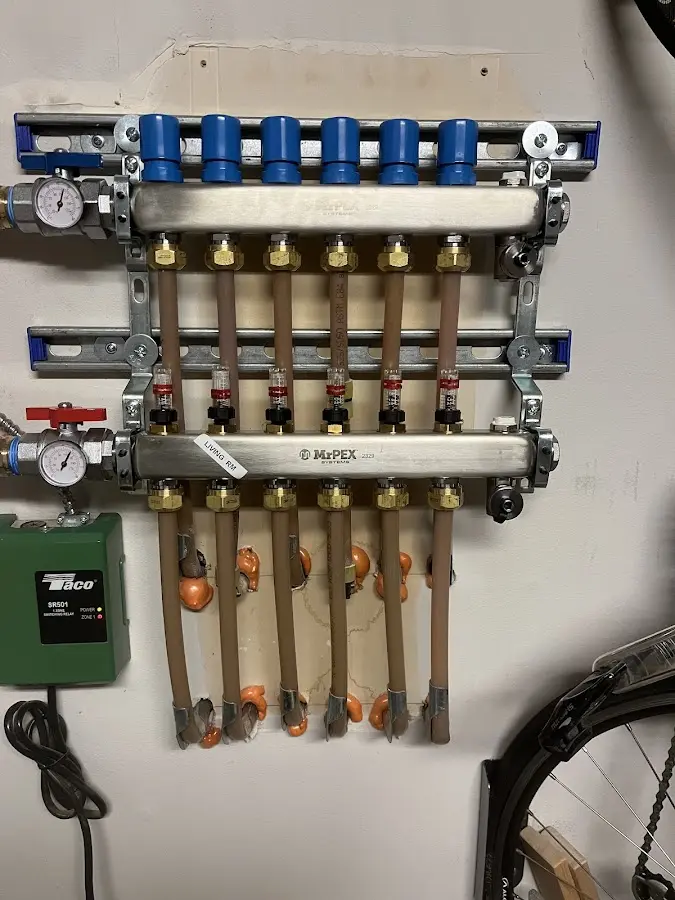 Plumber performing Water Heater Repair at a residential property in Blaine